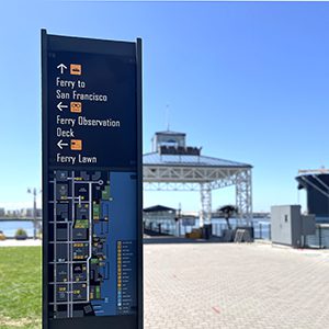 Pedestrian directional with the ferry in the background